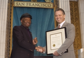 On the occasion, San Francisco Mayor Willie Brown (left) presented the Church with a proclamation commending “its efforts in making the Bay Area a better place for persons of all races, colors, creeds and walks of life.”